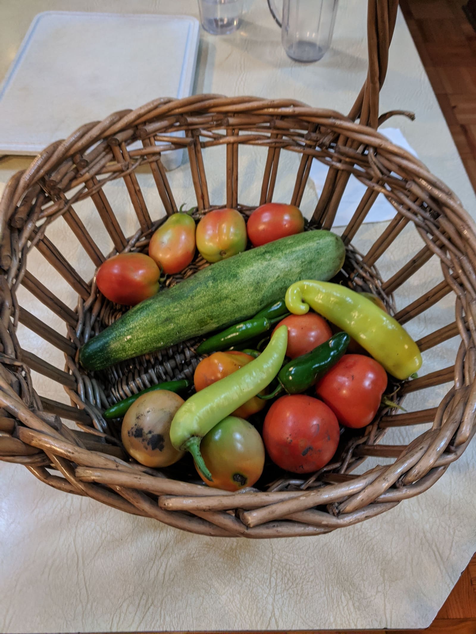 The week's harvest arranged on the table. July 2020.