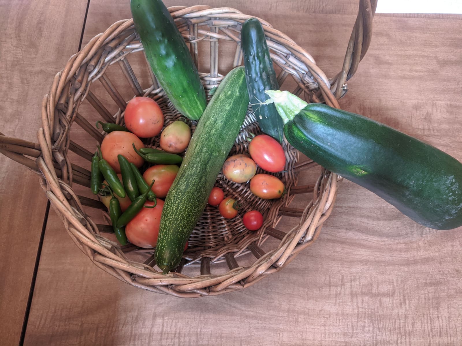 The week's harvest arranged on the table. August 2020.
